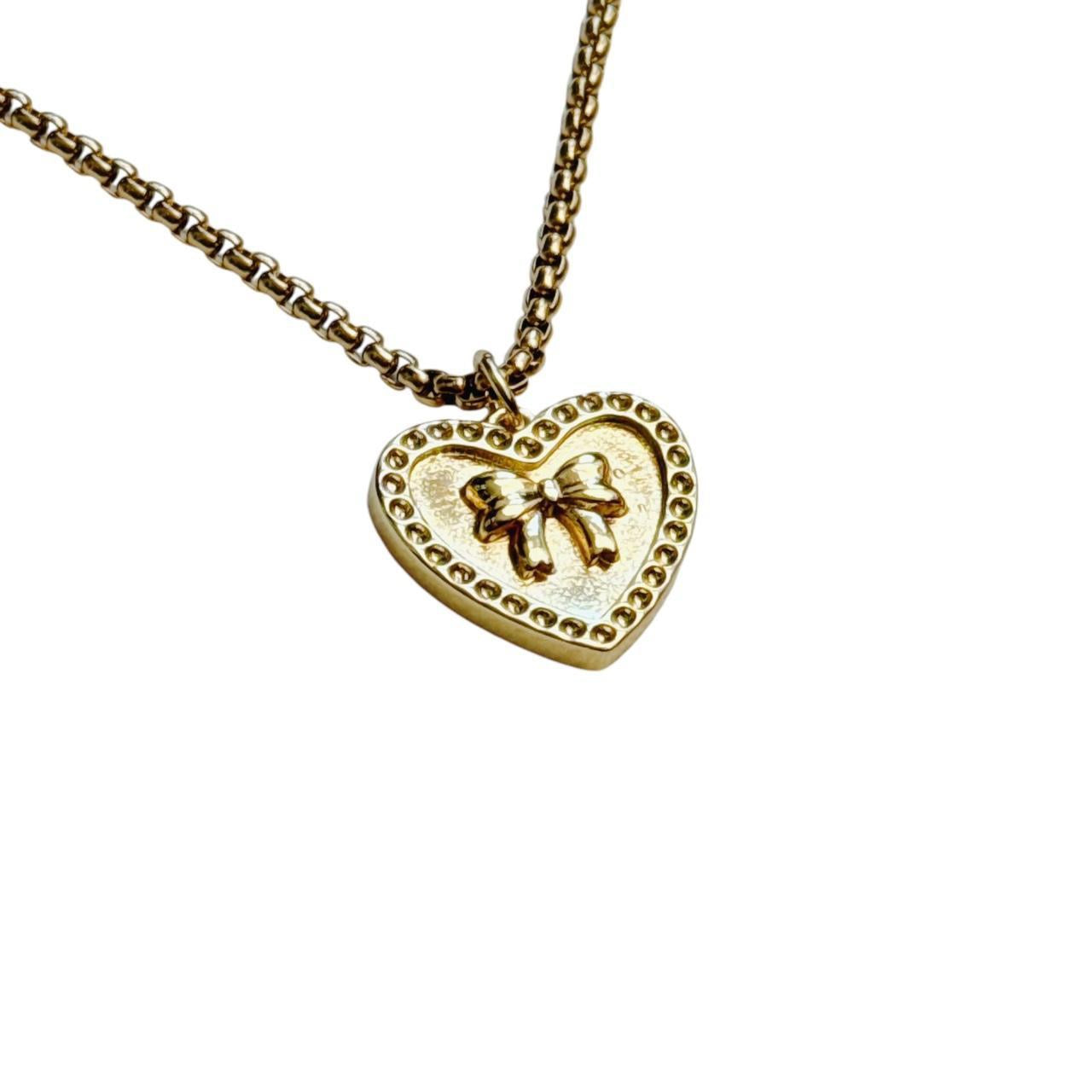 gold heart bow necklace