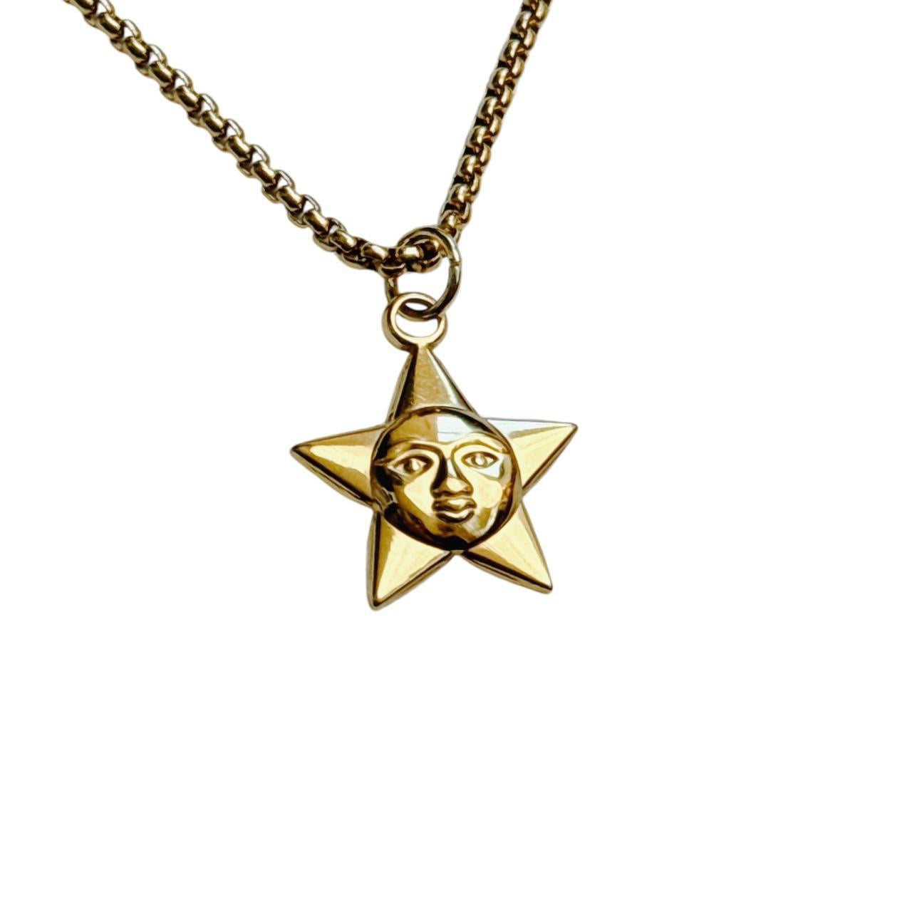 gold star moon face necklace