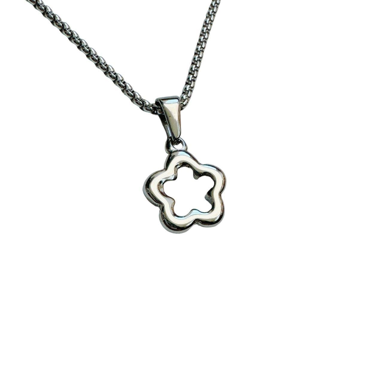 silver hollow flower necklace