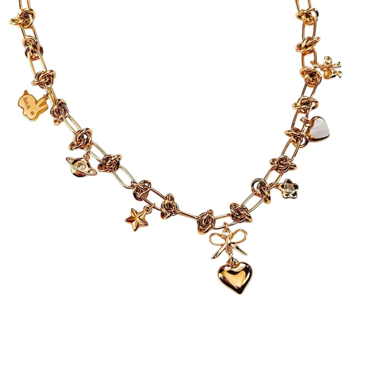 gold chainmail charm necklace - bow & heart