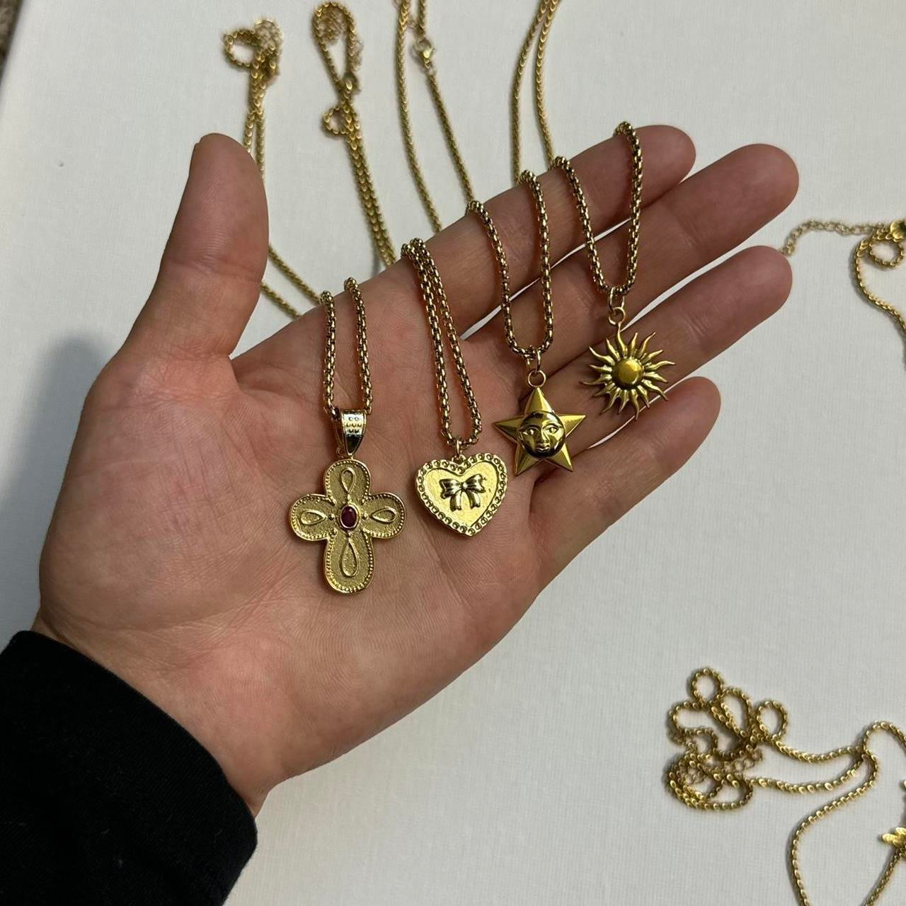 gold star moon face necklace