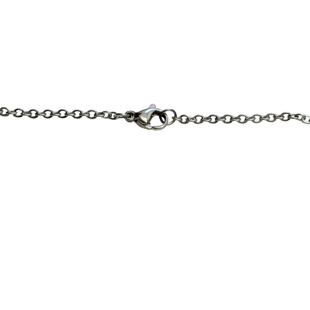 silver cross saturn necklace