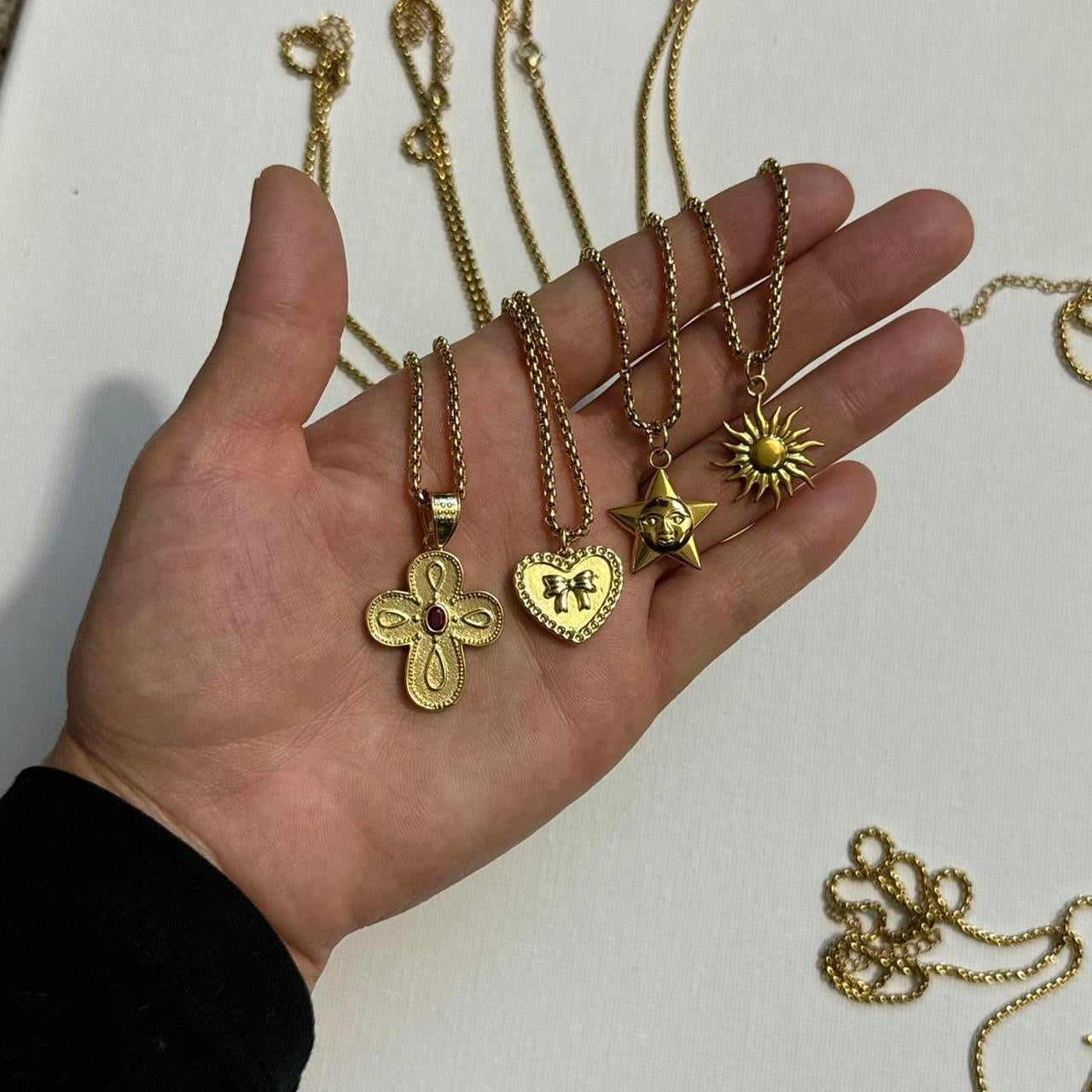 gold heart bow necklace