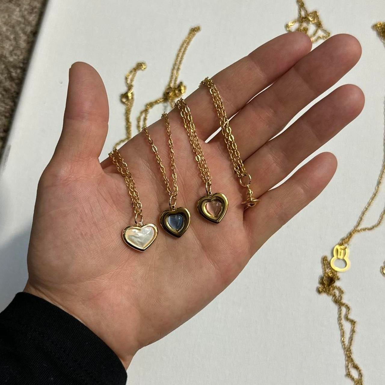 gold cross saturn necklace