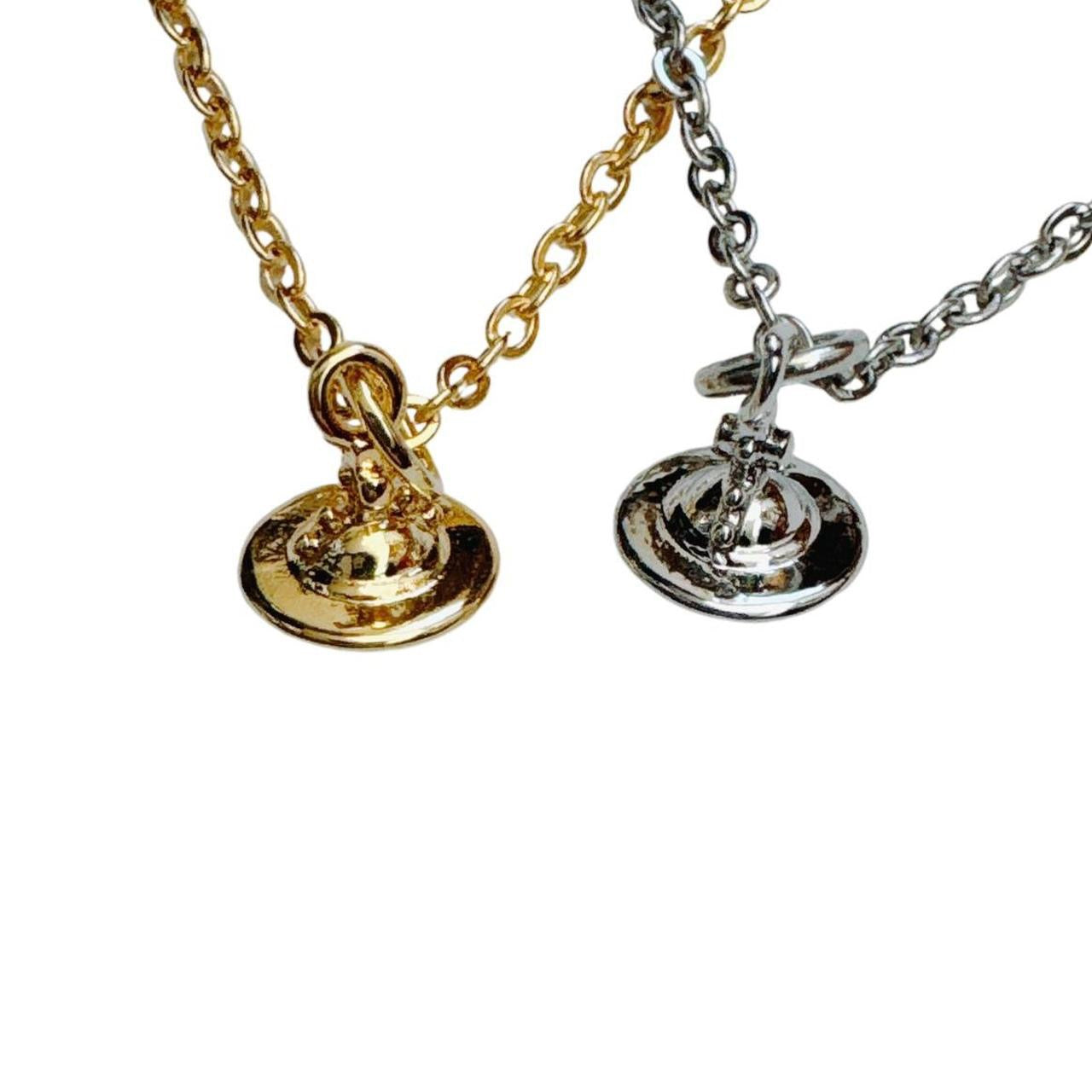 gold cross saturn necklace
