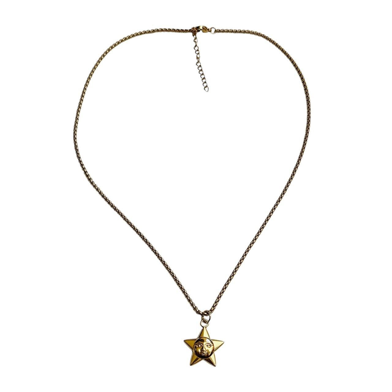 gold star moon face necklace