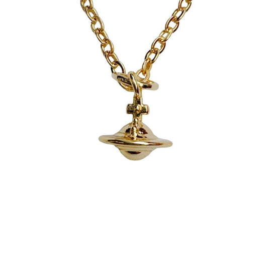 gold cross saturn necklace