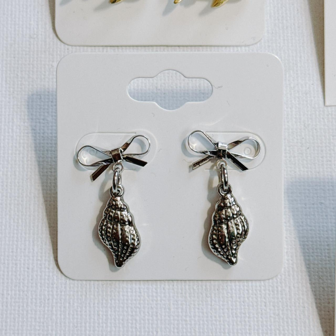 silver bow & shell earrings