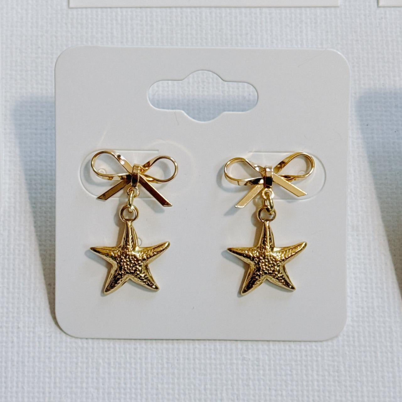 gold bow & starfish earrings