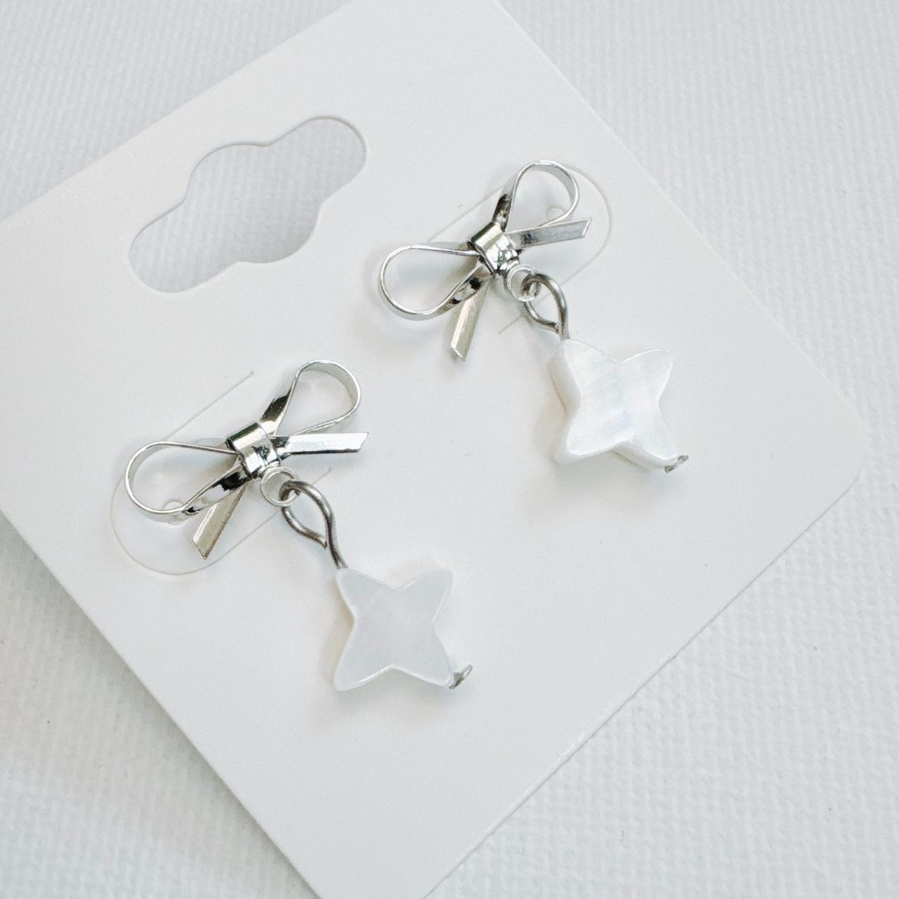 Silver Bow & Shell Sparkle Star Earrings