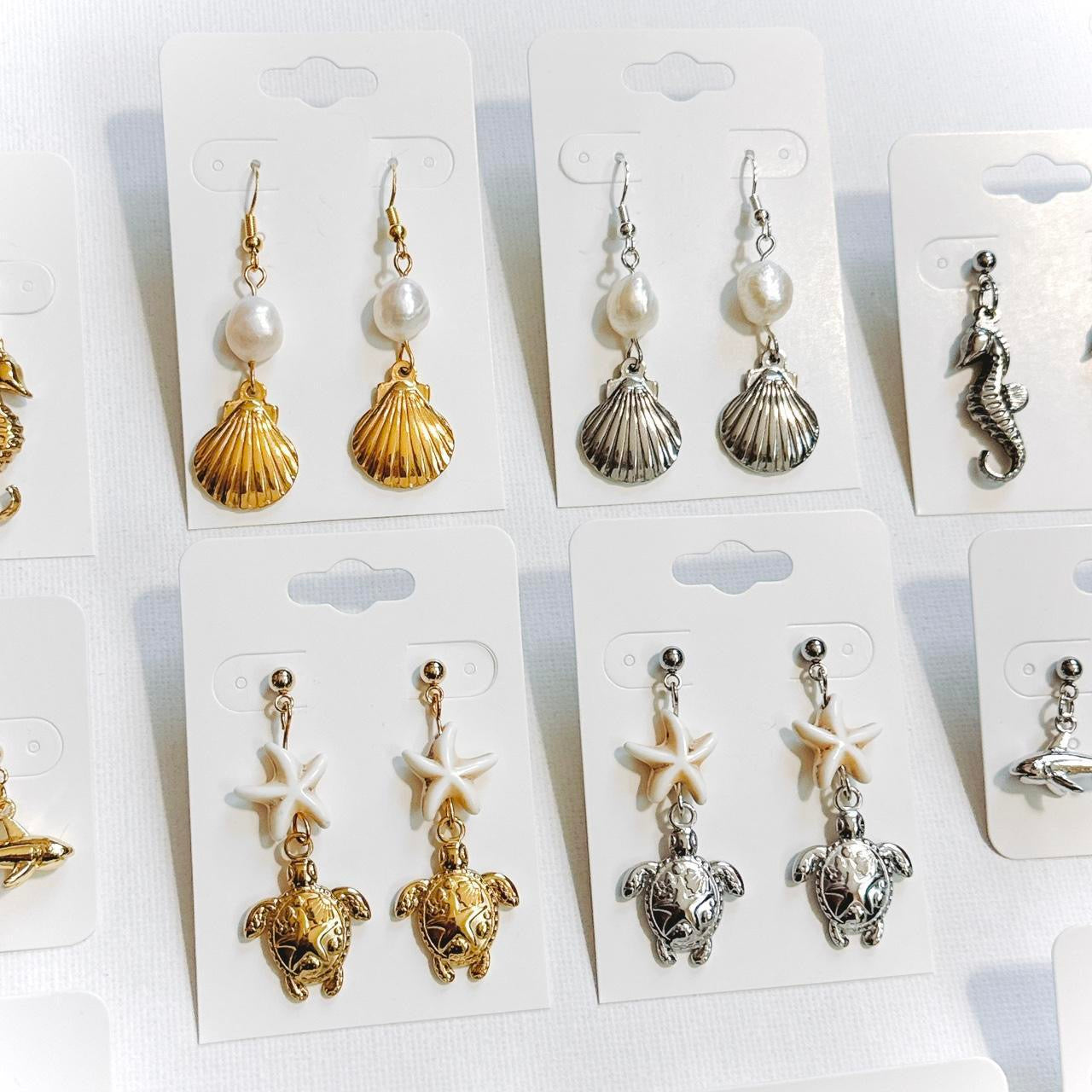 gold starfish sea turtle earrings