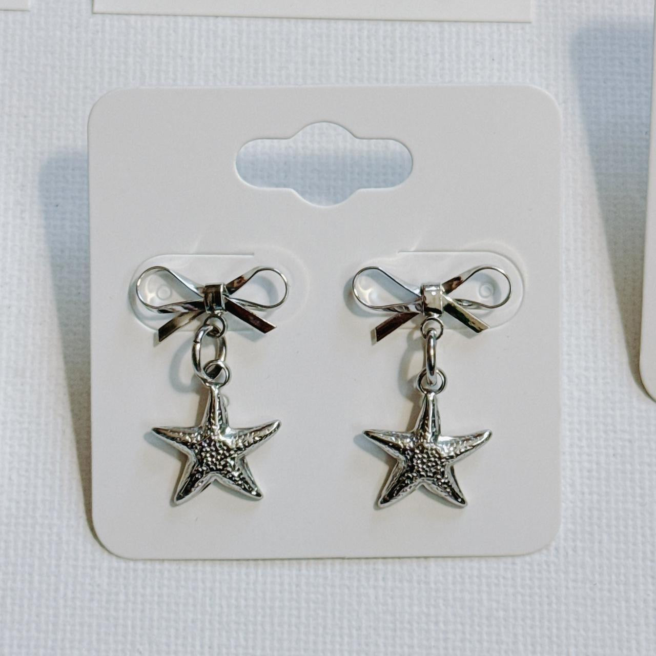 silver bow & starfish earrings