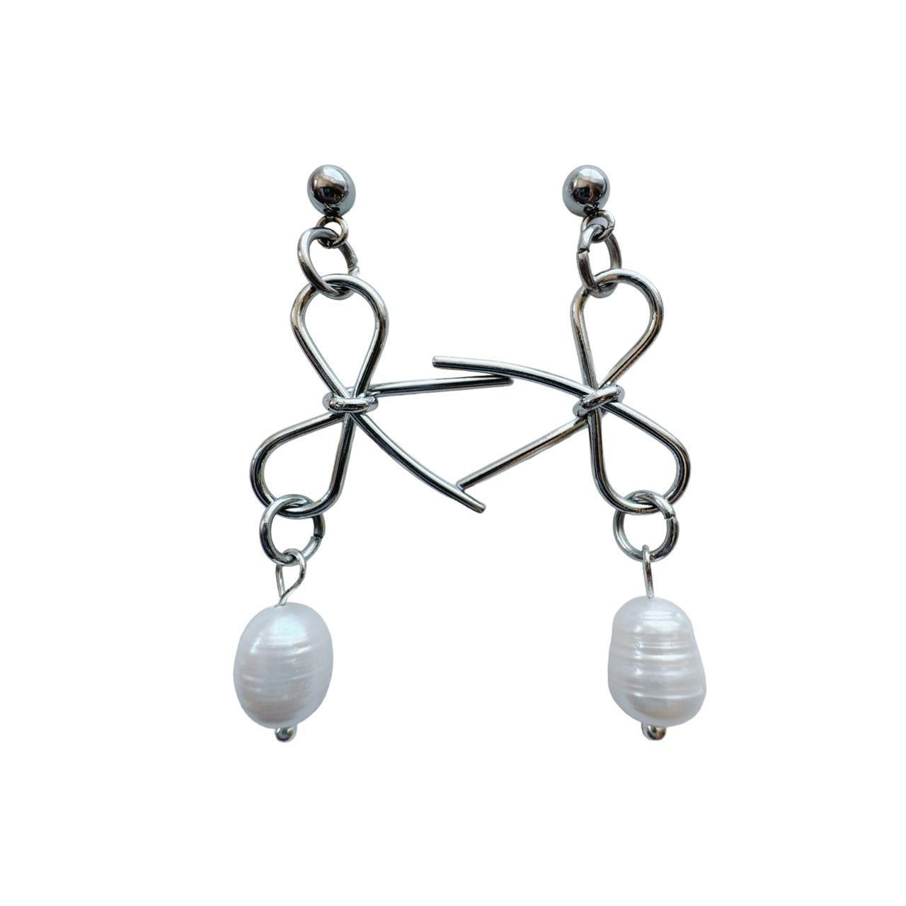 silver bow and pearl earrings