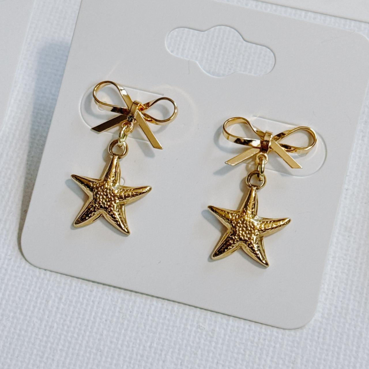 gold bow & starfish earrings