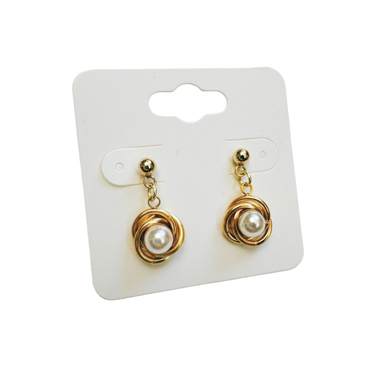 gold pearl vortex earrings