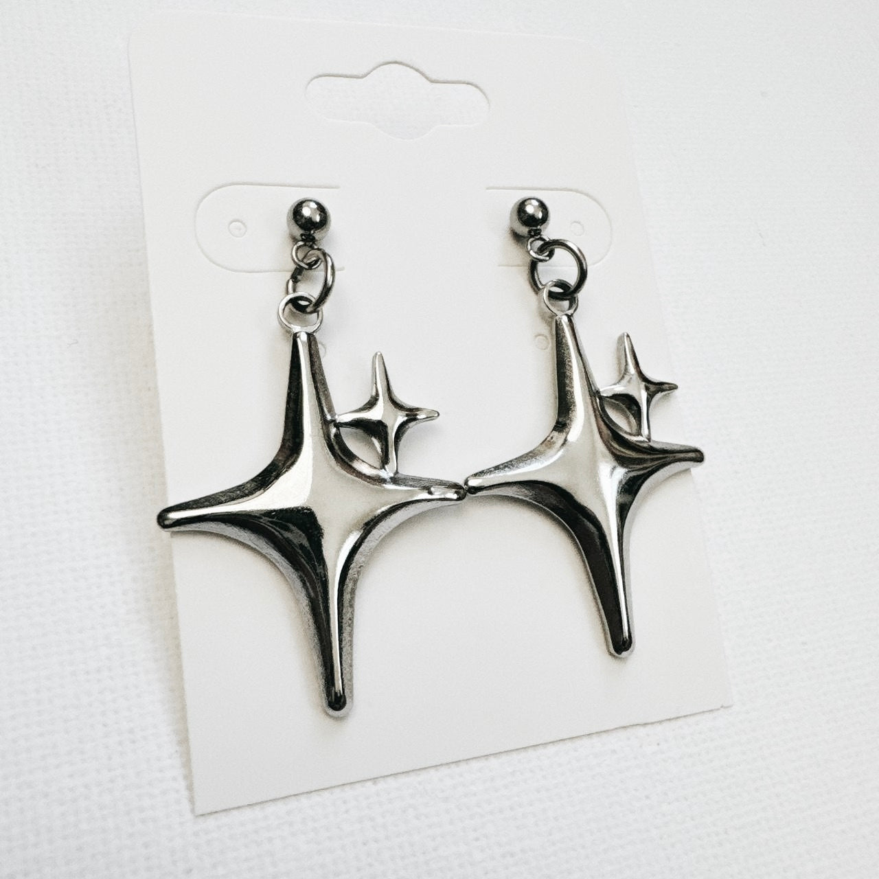 silver double sparkle star earrings