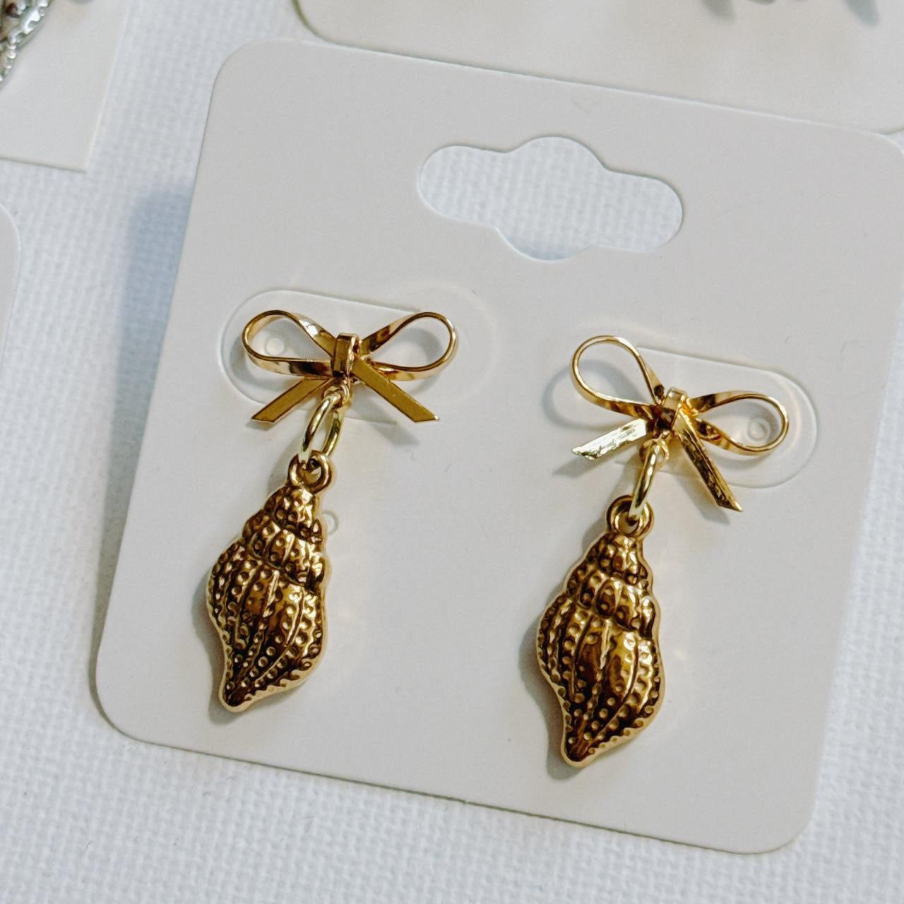 gold bow & shell earrings