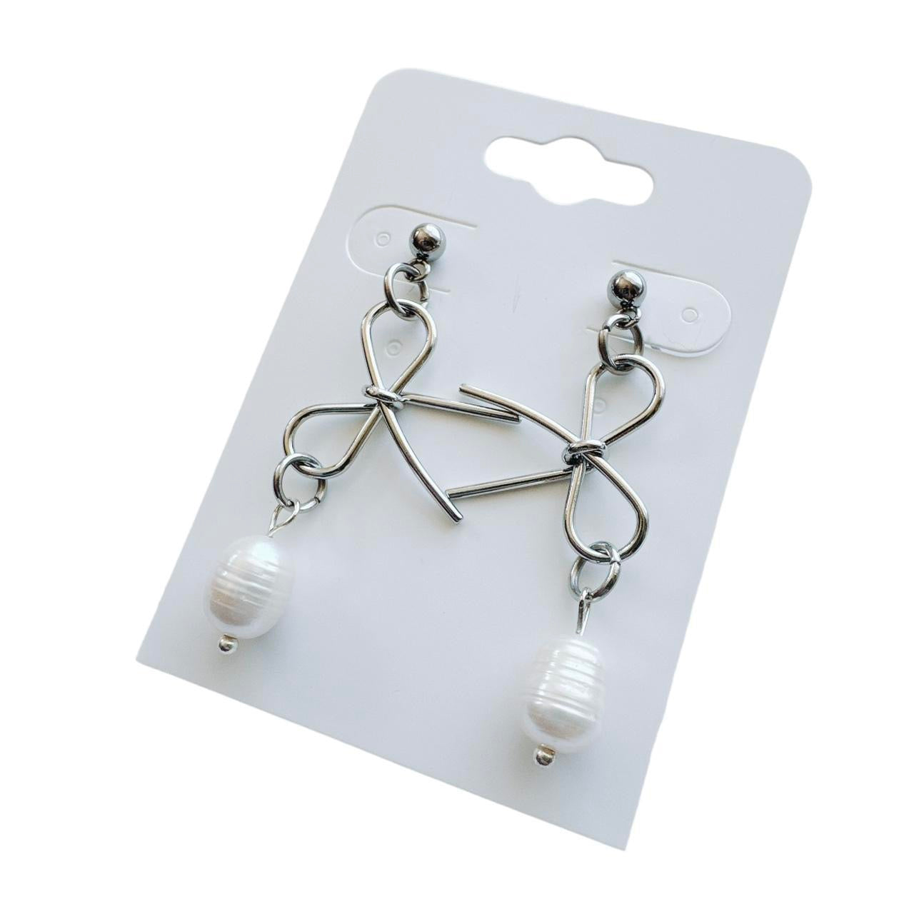 silver bow and pearl earrings