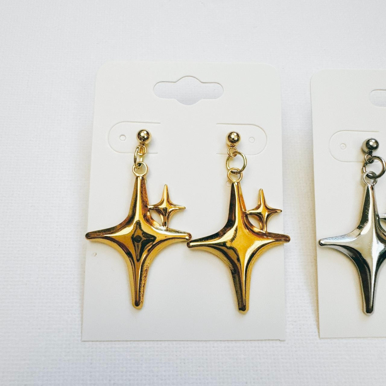 gold double sparkle star earrings