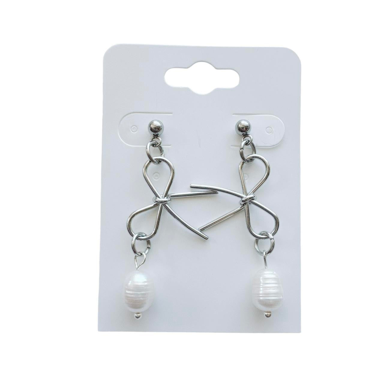 silver bow and pearl earrings