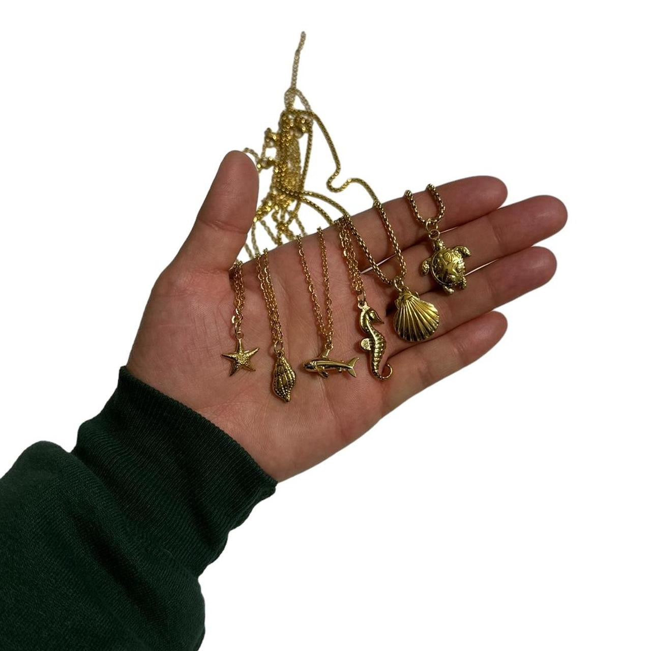 gold sea snail shell necklace