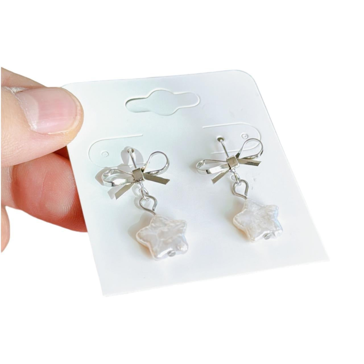 Silver Bow & Pearl Star Earrings