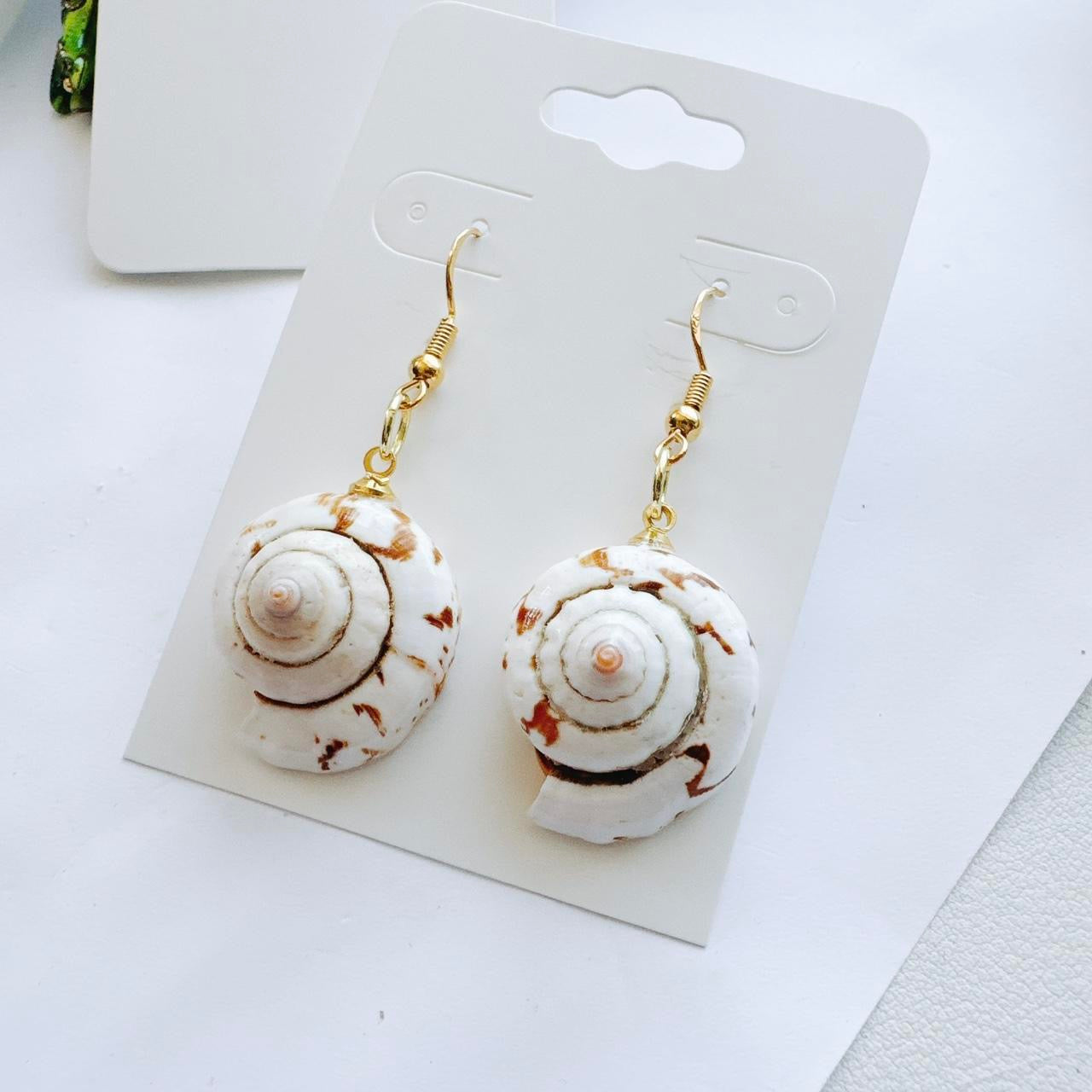 gold spiral shell earrings