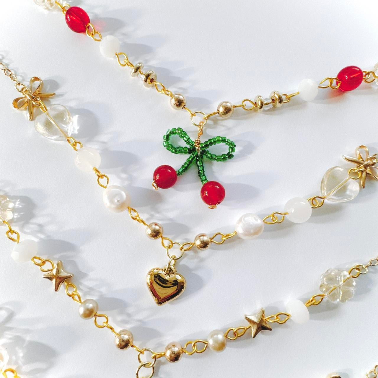 Gold Cherry Bow Beaded Necklace