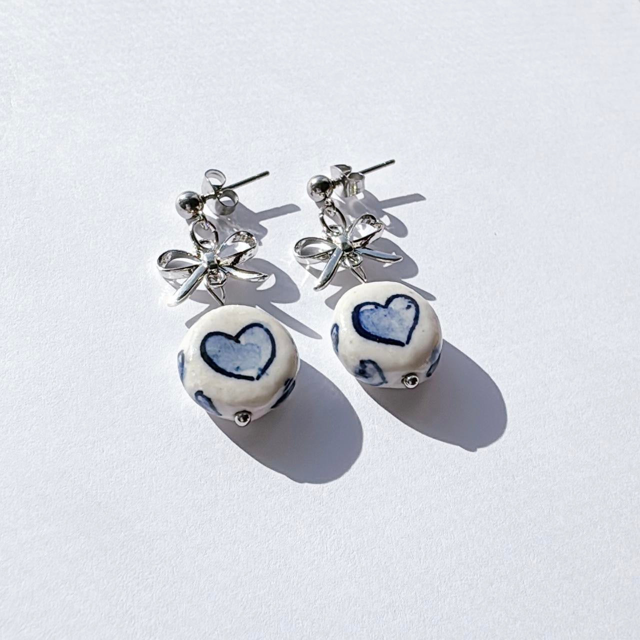 Silver Bow & Porcelain Heart Earrings