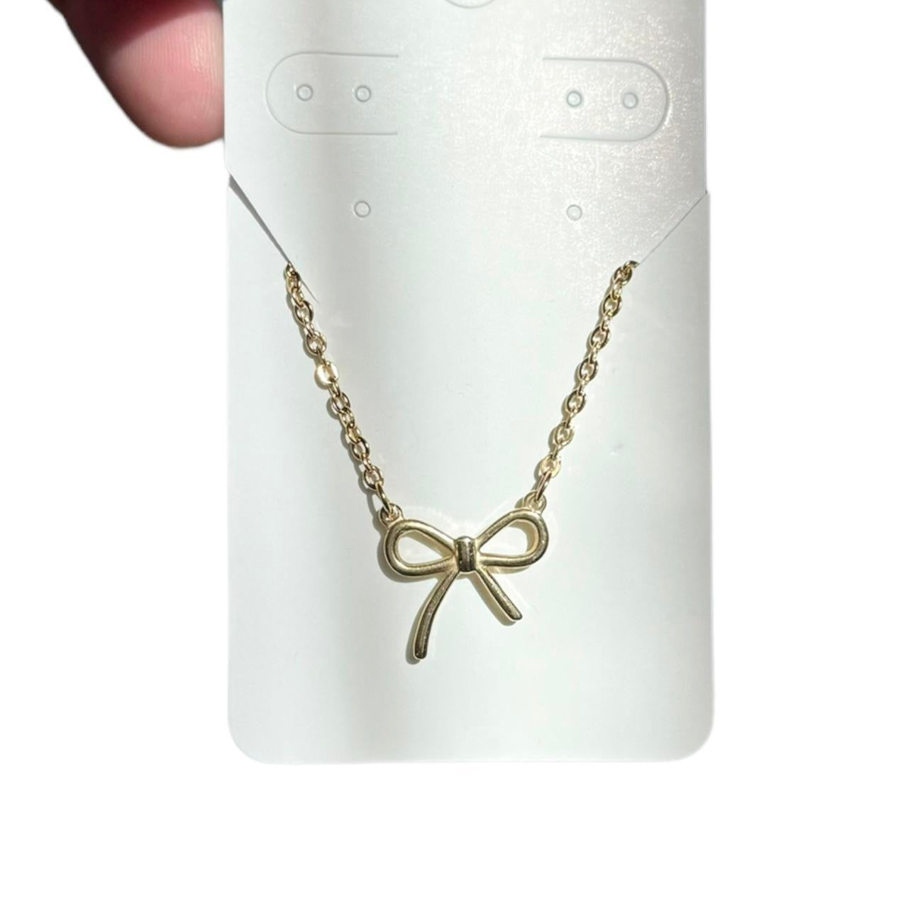 Gold Bow Necklace ౨ৎ