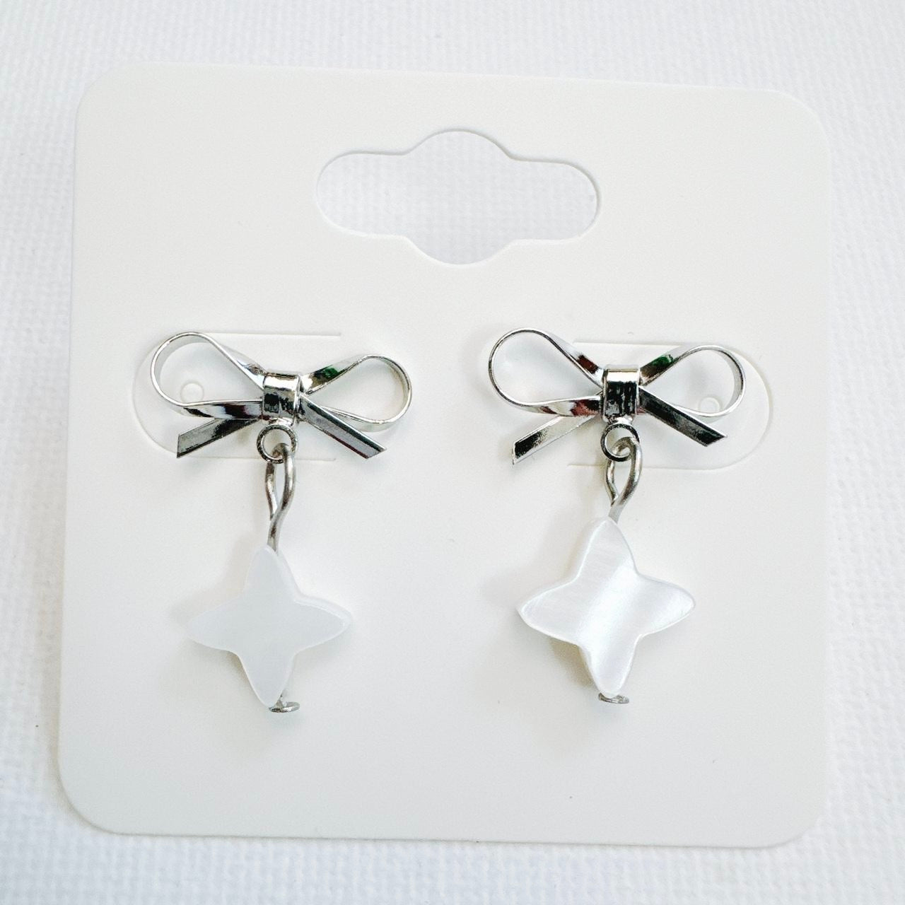 Silver Bow & Shell Sparkle Star Earrings