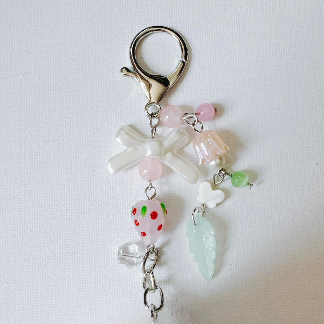 white fluffy bunny keychain - pink strawberry